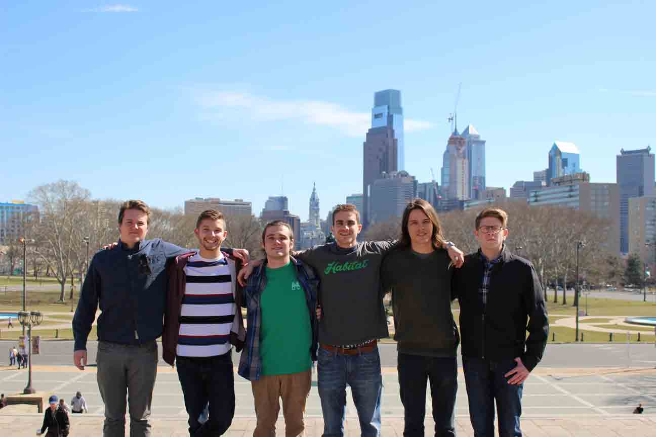 First Delivery team with Philadelphia skyline